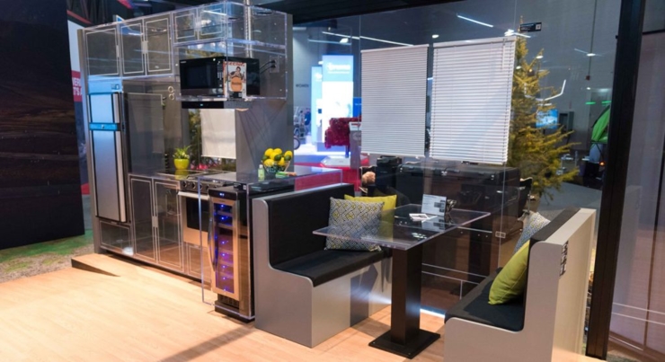 Interior view of kitchen and dinette inside acrylic RV